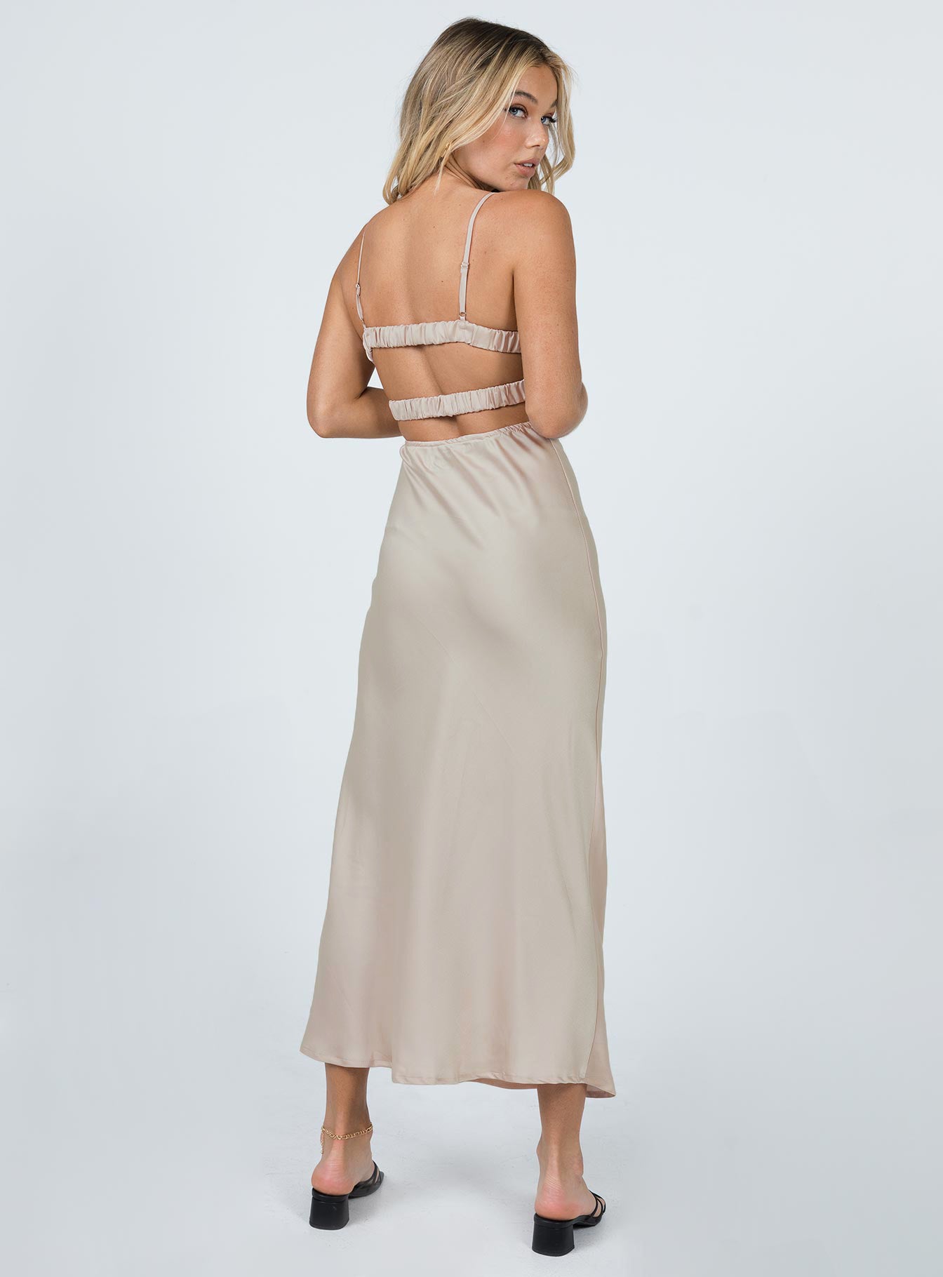 Front view of model wearing  front Princess Polly Square Neck  Lillie Midi Dress Beige