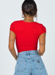 back view of model wearing Princess Polly Nicola Bodysuit Red Short Sleeves 