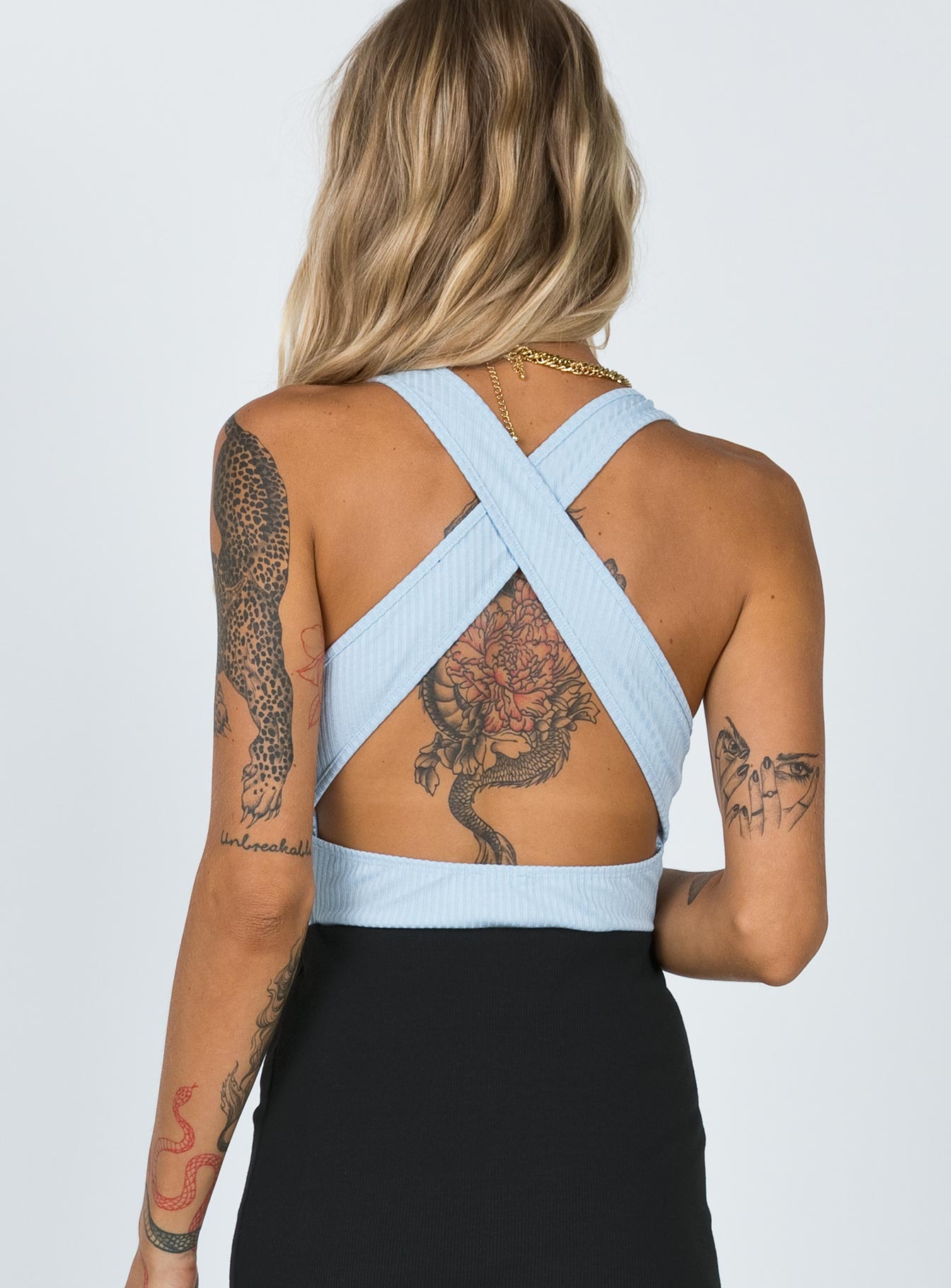 back view of model wearing Princess Polly Atticus Bodysuit Blue Sleeveless Scoop Neck 