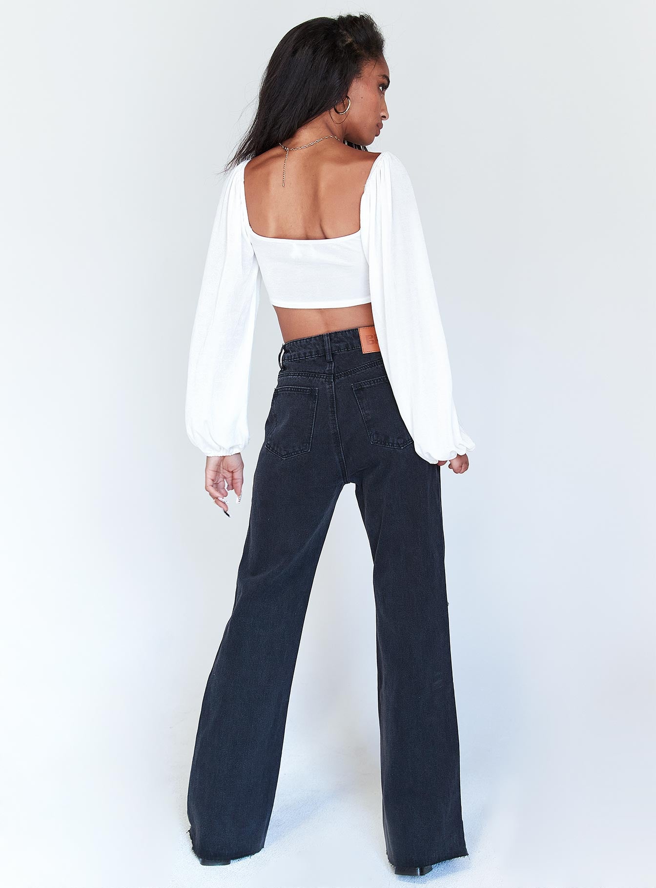 back view of model wearing Princess Polly Londyn Denim Jeans Black Mid Rise 