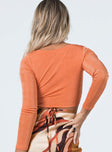 back view of model wearing Princess Polly Lucille Long Sleeve Top Orange 