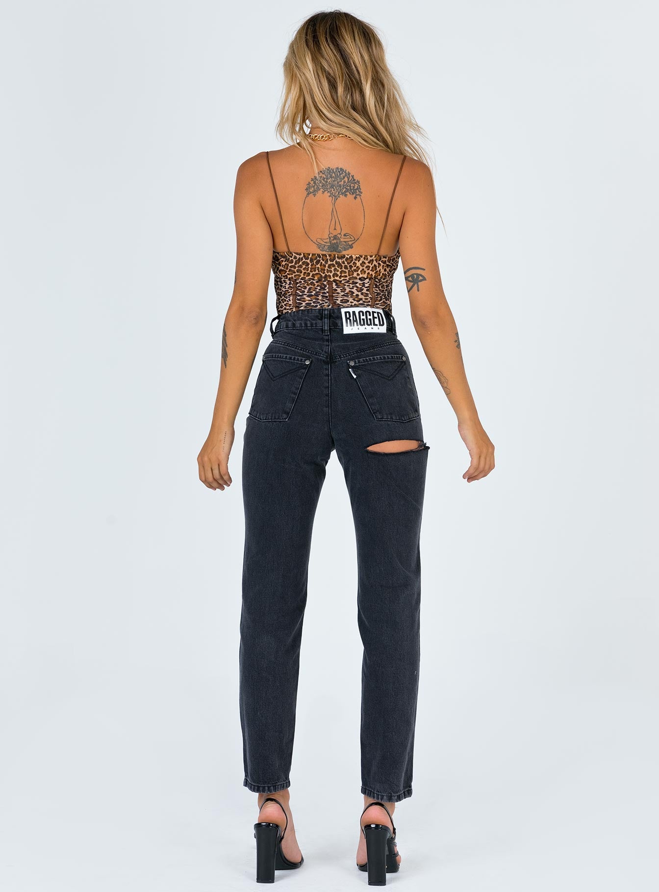 back view of model wearing Princess Polly Ragged Priest Butt Cut Jean Mid Rise 