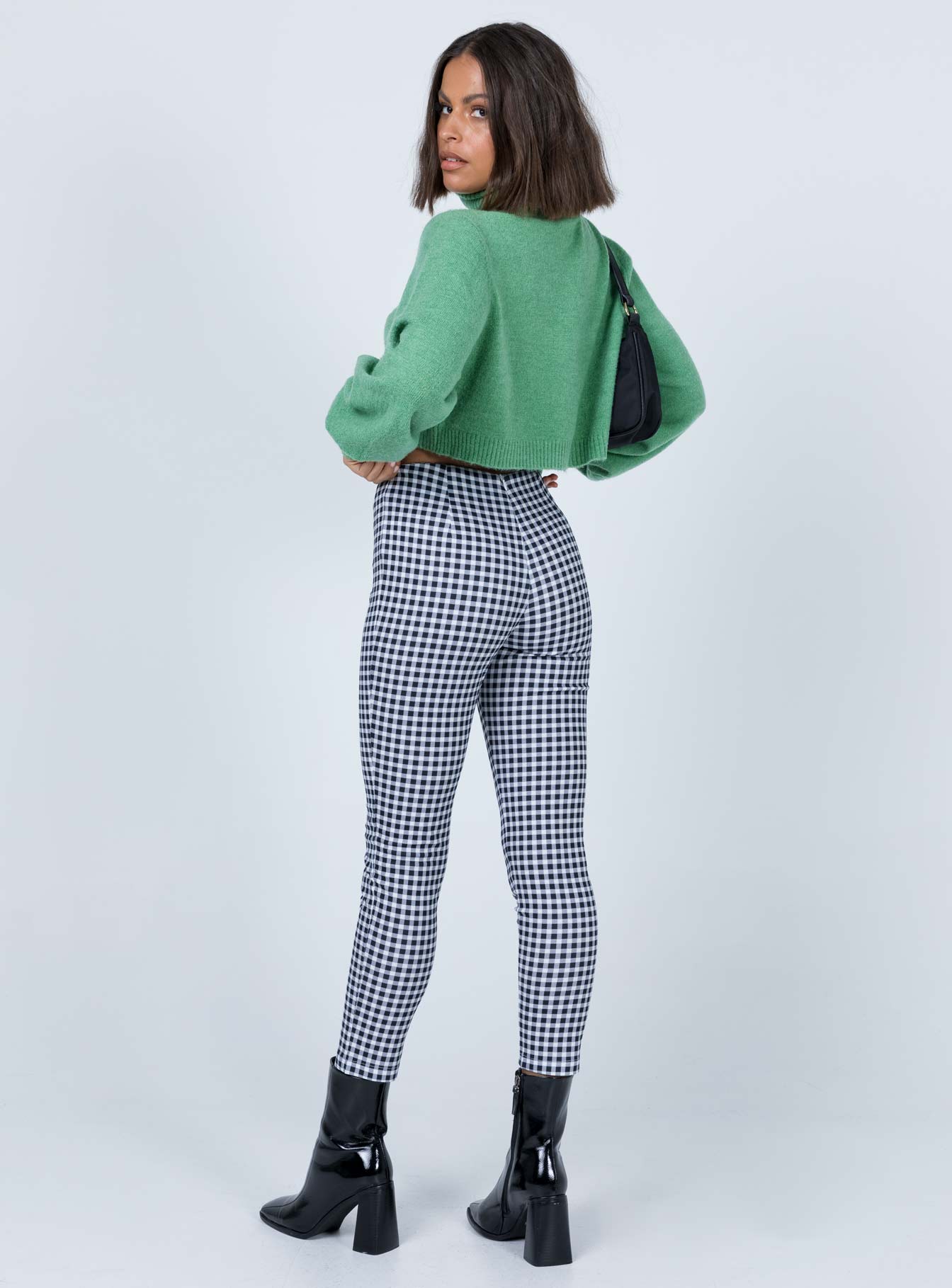 back view of model wearing Princess Polly Iggy Gingham Pants Black/White 