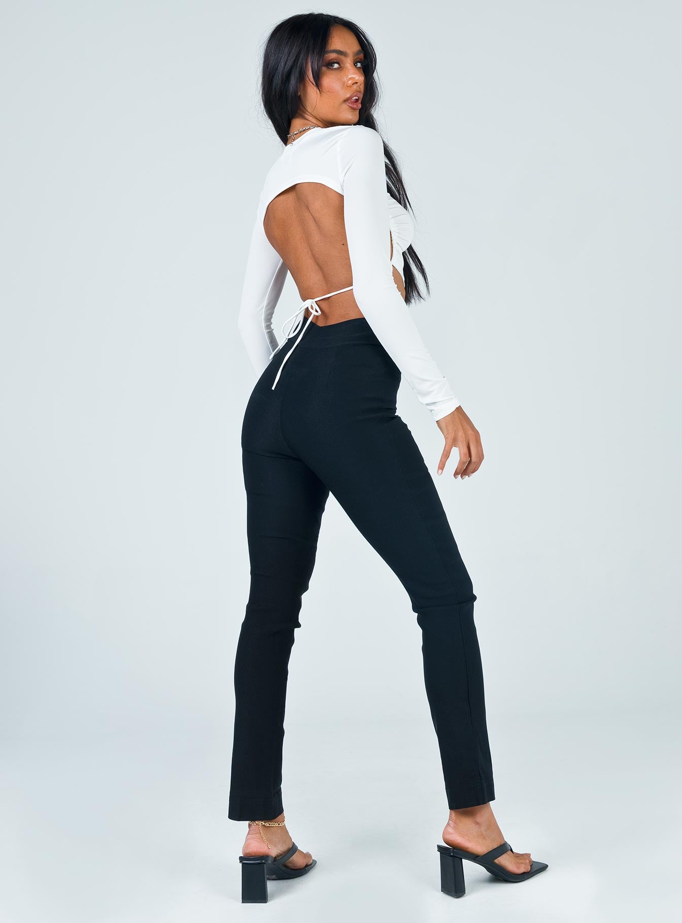 back view of model wearing Princess Polly Mikaela Pants Black 