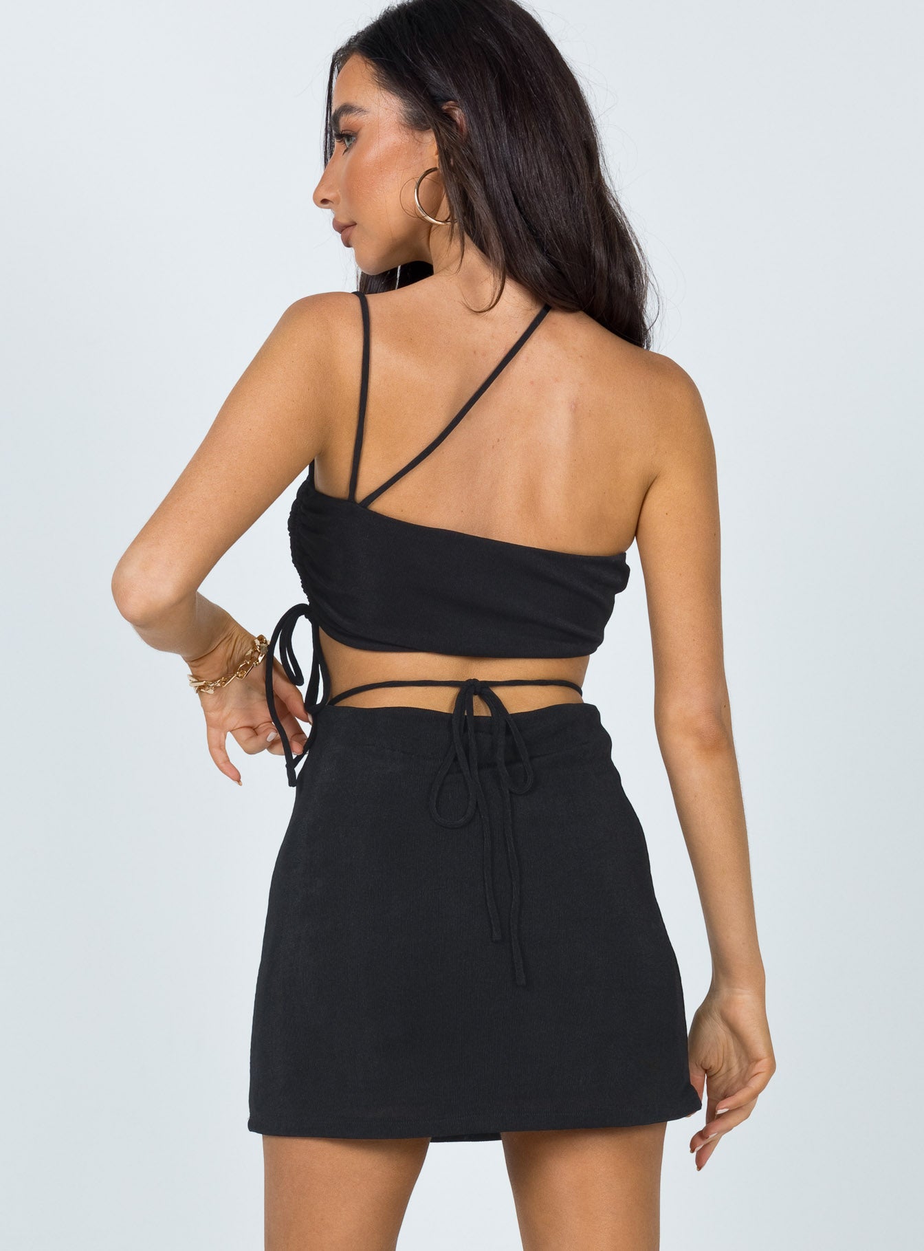 back view of model wearing Princess Polly Maisie Mini Skirt Black 