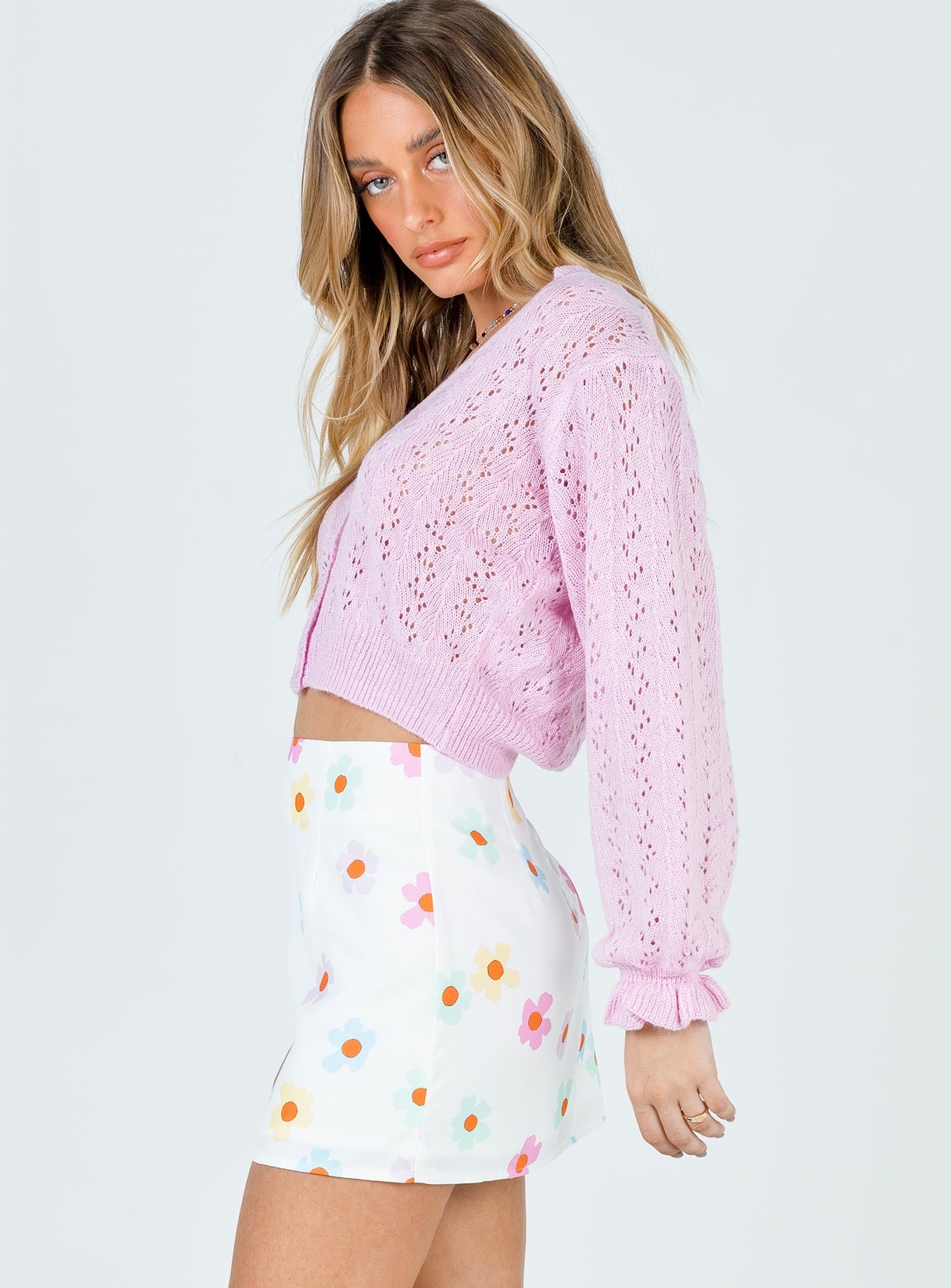   side view of model wearing Princess Polly Mishka Mini Skirt White 