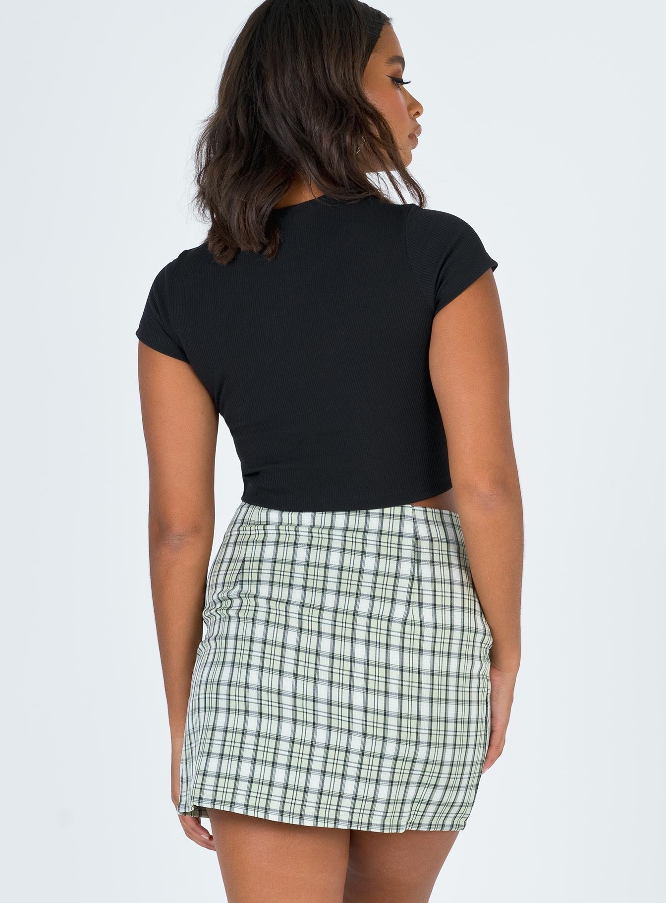 back view of model wearing Princess Polly Spencer Mini Skirt 