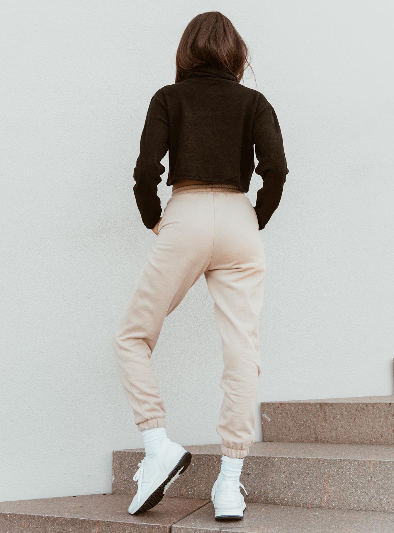 back view of model wearing Princess Polly Nero Sweat Pants Beige 