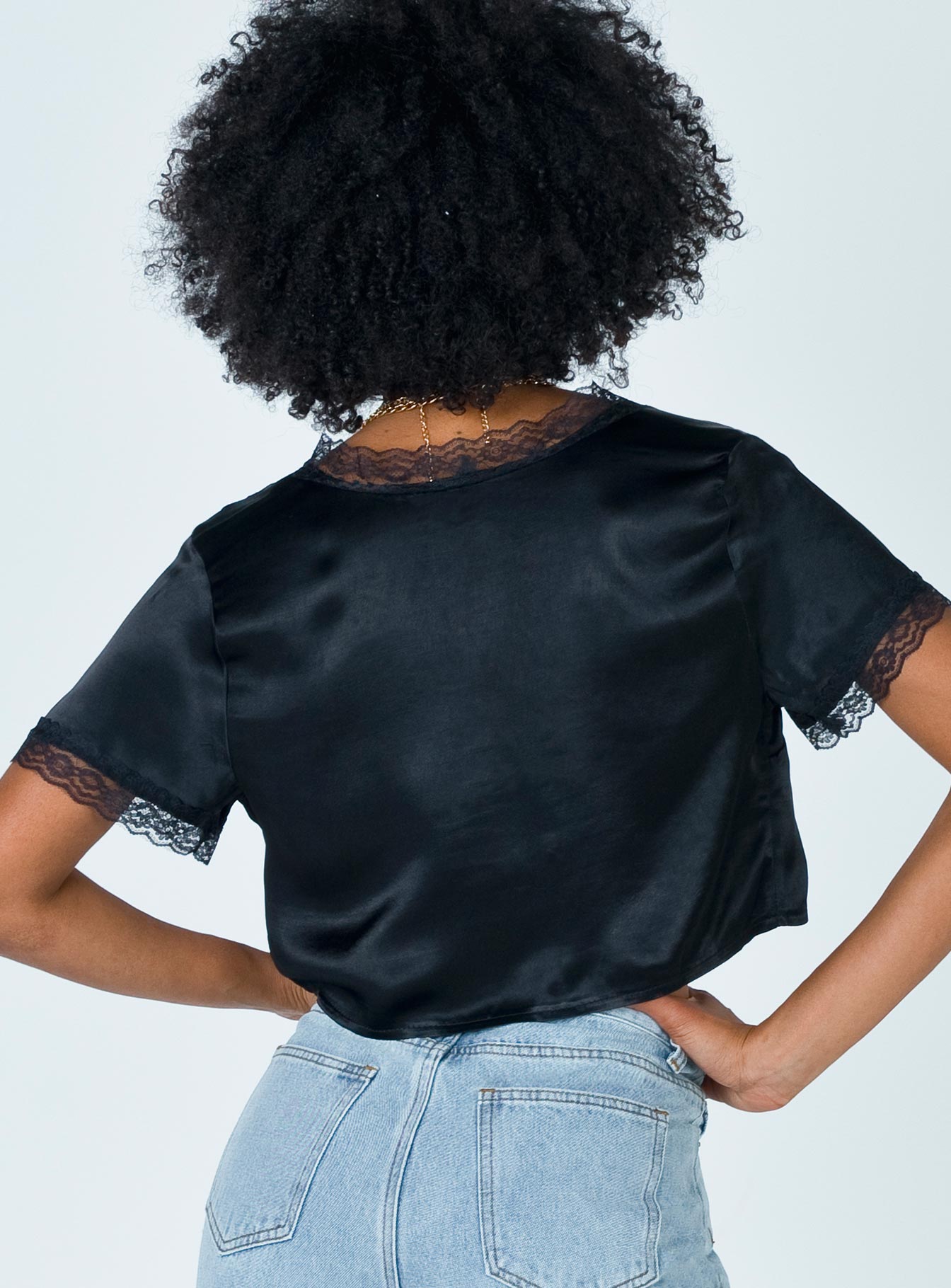 back view of model wearing Princess Polly Vintage Tie Up Top Black 