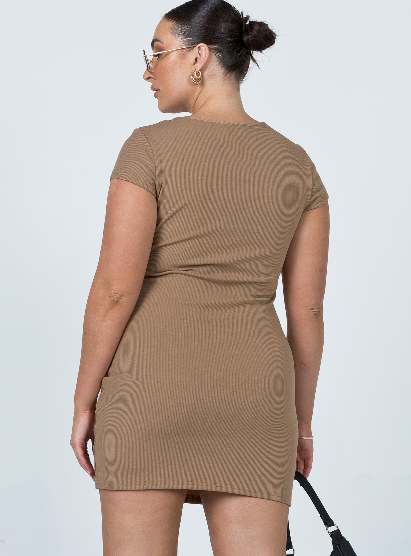 back view of model wearing Princess Polly Caleb Mini Dress Brown 