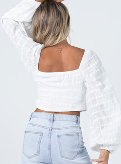 back view of model wearing Princess Polly Riley Long Sleeve Top White 
