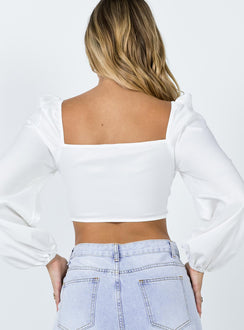 back view of model wearing Princess Polly Carson Long Sleeve Top White Lower Impact Full Sleeves Sweetheart 