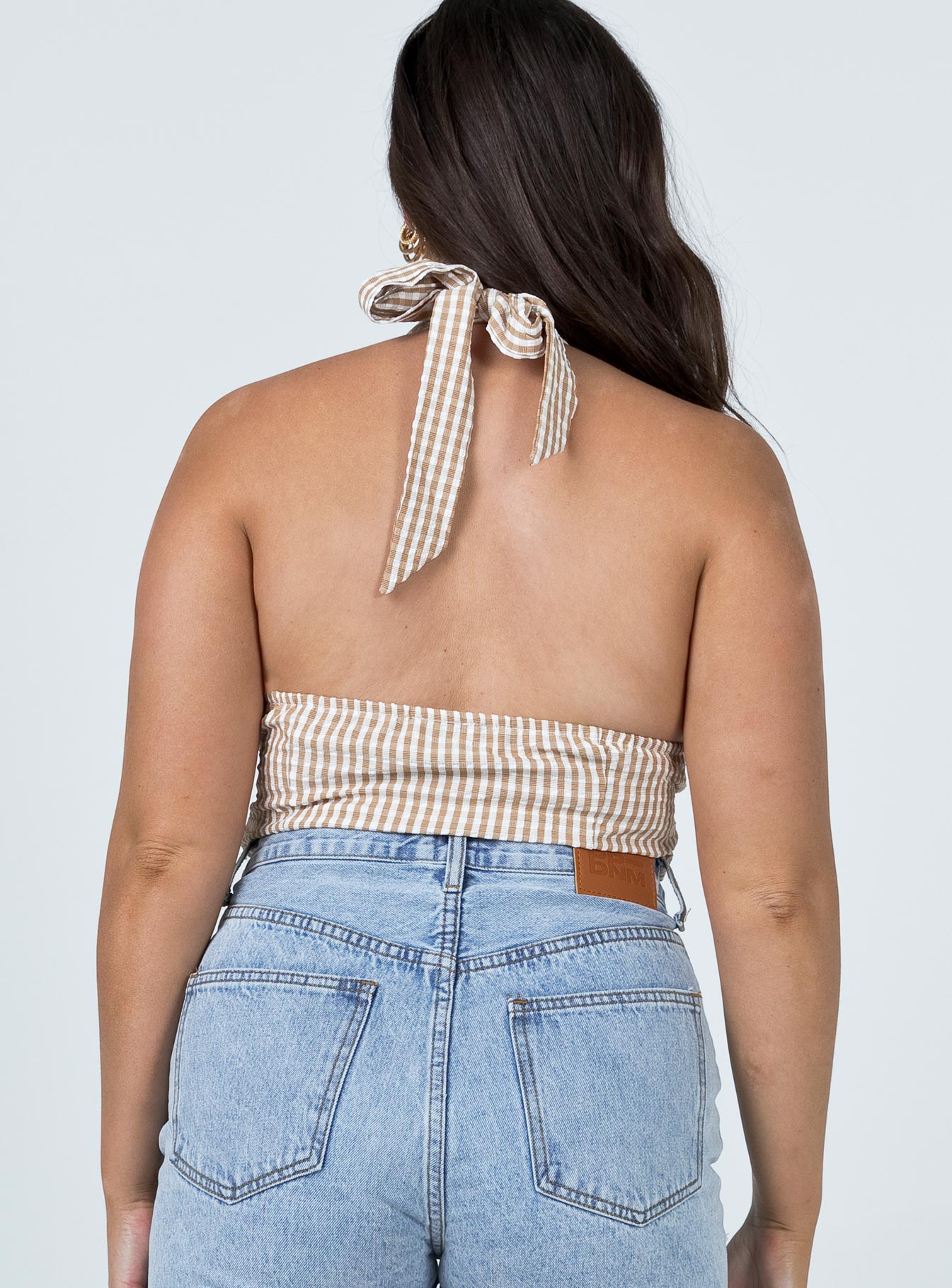 back view of model wearing Princess Polly Ensley Top Brown 