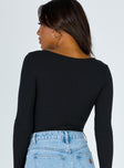 back view of model wearing Princess Polly Barlise Bodysuit Black Full Sleeves V-Neck 