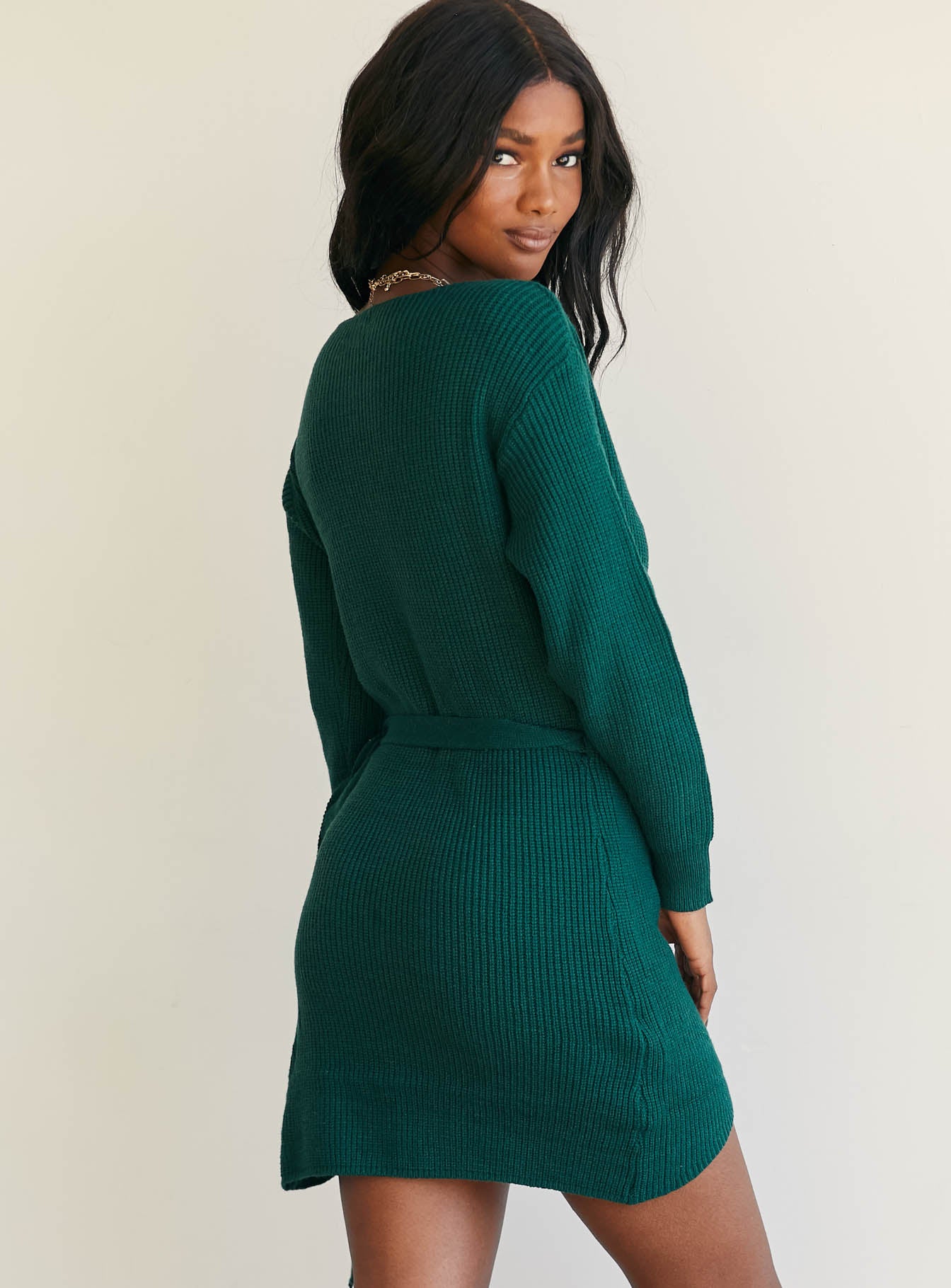 back view of model wearing Princess Polly Phenix Mini Dress Forest Green 