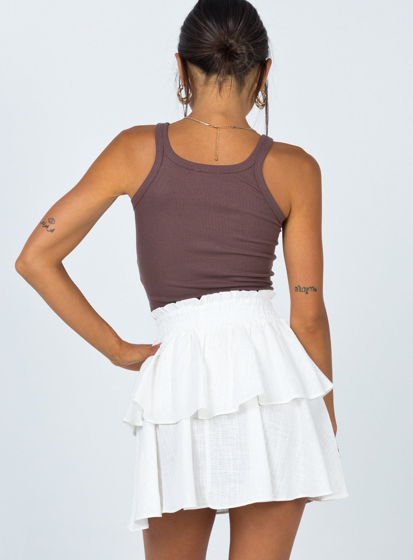 back view of model wearing Princess Polly Greta Mini Skirt Off White 