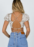 back view of model wearing Princess Polly Starling Crop Top Beige Leopard 