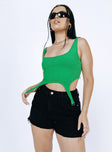 Front view of model wearing  front Princess Polly Sleeveless Square Neck  Mackenzie Top Green