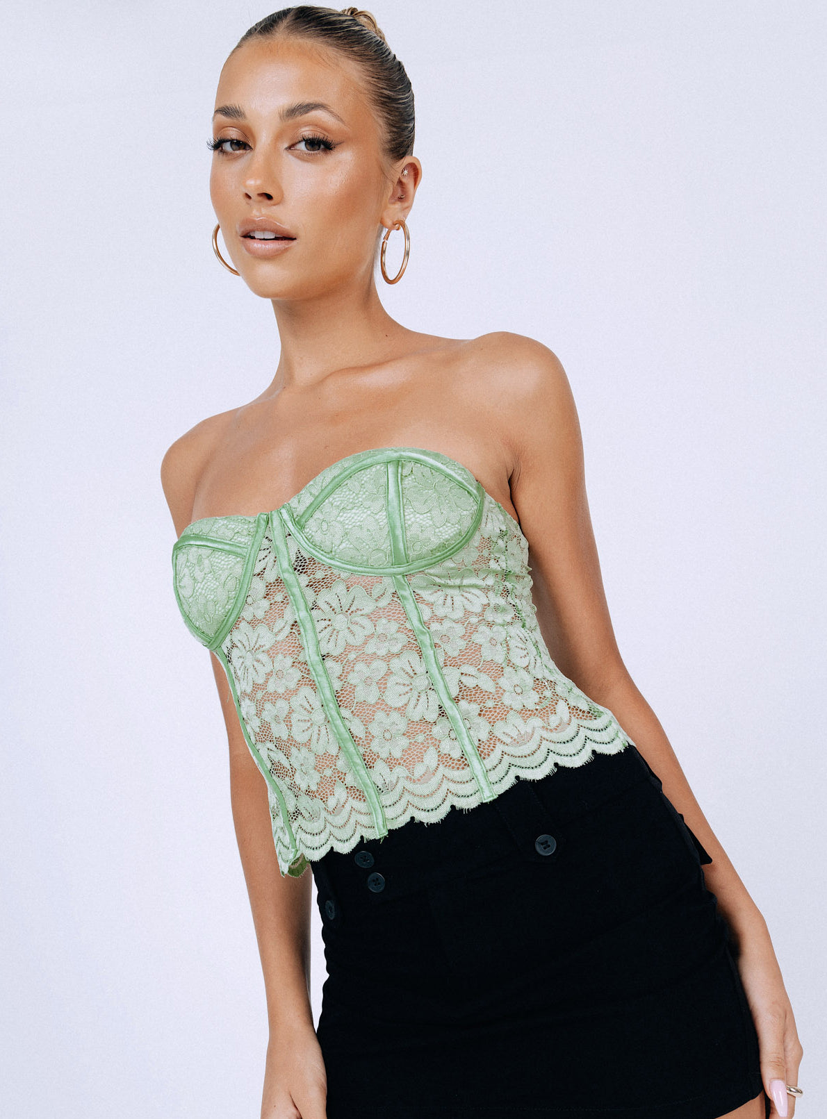 Front view of model wearing  front Princess Polly Sleeveless Asymmetric Neckline  Luani Top Green