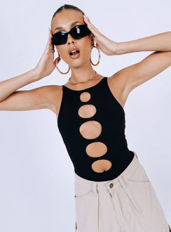 side view of model wearing Princess Polly Nash Bodysuit Black Sleeveless Crew Neck 