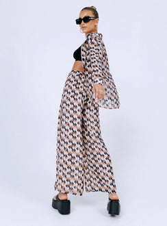 Matching set Sheer material  Geometric print  Button up shirt  High waisted pants  Elasticated drawstring waistband  Wide leg