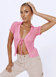 Front view of model wearing  front Princess Polly Short Sleeves Scoop Neck  Westin Top Pink