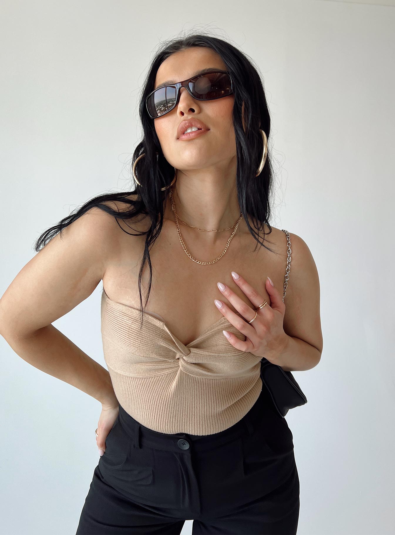 side view of model wearing Princess Polly Kallista Bodysuit Beige Sleeveless Sweetheart 