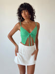 Front view of model wearing  front Princess Polly Sleeveless Square Neck  Mayson Top Green