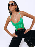 Front view of model wearing  front Princess Polly Sleeveless Scoop Neck  Louisa Top Green