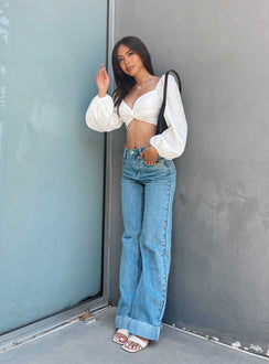 front view of model wearing Princess Polly Carson Long Sleeve Top White Lower Impact Full Sleeves Sweetheart 