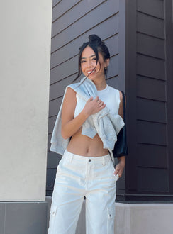 side view of model wearing Princess Polly Monterey Top White Sleeveless Crew Neck 