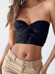 Front view of model wearing  front Princess Polly Sleeveless Sweetheart  Kemper Strapless Top Black