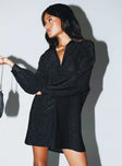 Front view of model wearing  front Princess Polly V-Neck  Evolving Shirt Dress Black