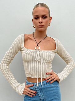 Front view of model wearing  front Princess Polly Full Sleeves Square Neck  Mellow Long Sleeve Top Cream