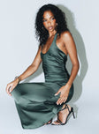 Front view of model wearing  front Princess Polly Asymmetric Neckline  Kodiak Halter Maxi Dress Green