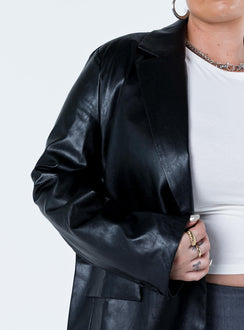 Black blazer Faux leather material Twin front pockets Padded shoulders Fully lined