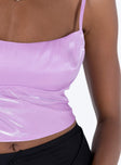 Crop top Shimmery material Adjustable shoulder straps Scooped neckline Tie fastening at back