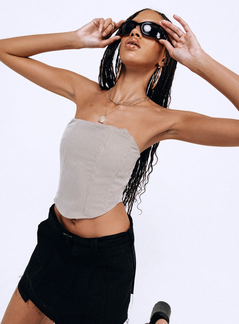 Front view of model wearing  front Princess Polly Sleeveless Asymmetric Neckline  Halford Bustier Top Houndstooth