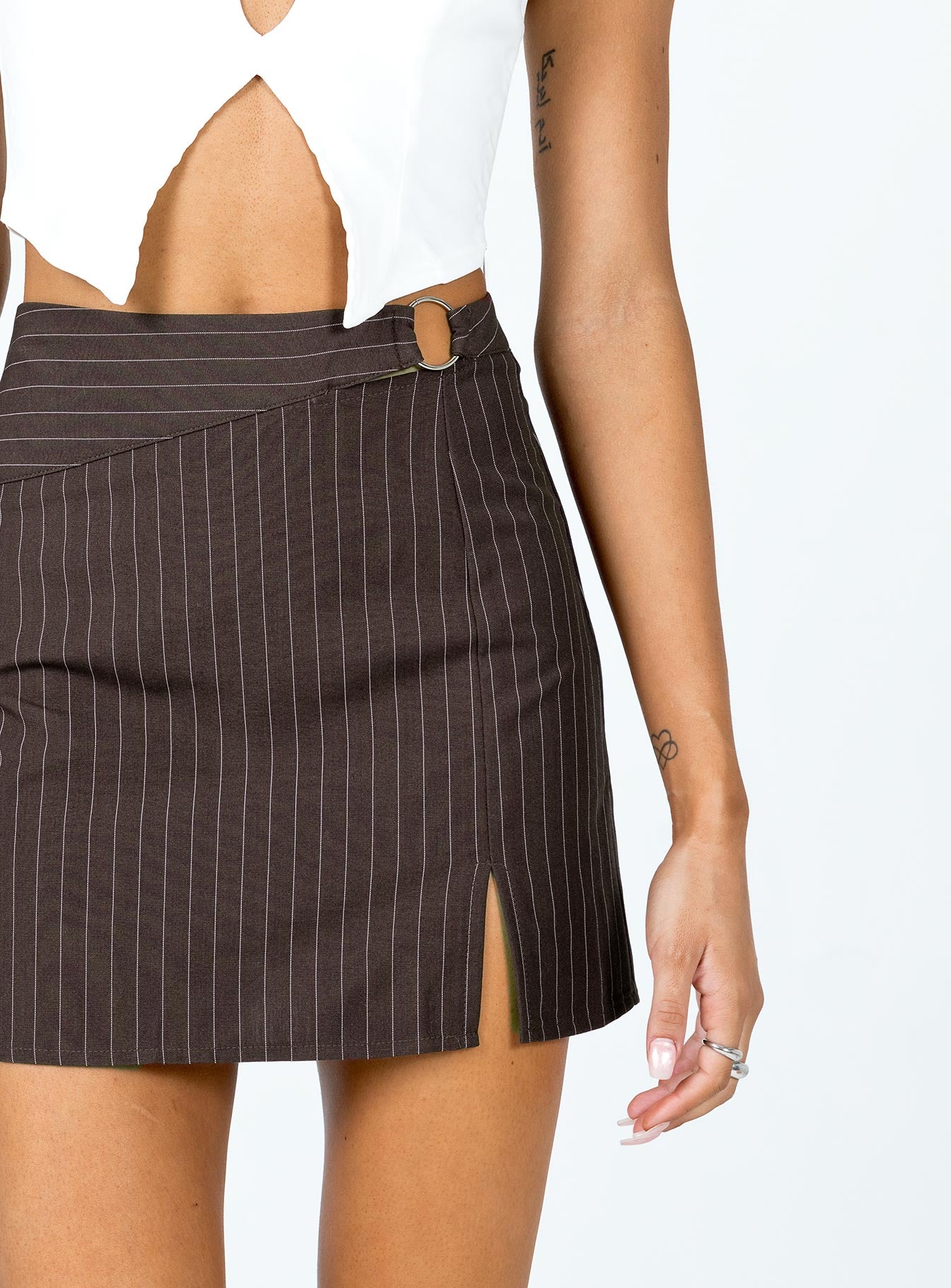 back view of model wearing Princess Polly Neo Pinstripe Mini Skirt Brown 