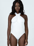 front view of model wearing Princess Polly Baldwin Bodysuit White Sleeveless High Neck 