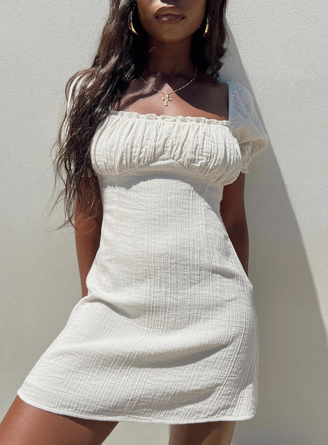 Front view of model wearing  front Princess Polly High Neck  Langham Mini Dress Ivory
