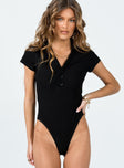 front view of model wearing Princess Polly Montrose Bodysuit Black Short Sleeves V-Neck 