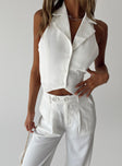 White matching set Vest top Fixed halter neck Button front fastening  High waisted pants  Zip & button fastening  Belt looped waist  Twin hop pockets  Elasticated waistband  Pleated design  Wide leg 