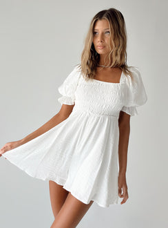 White romper Elasticated shoulders Puff sleeves  Shirred bust Double back tie fastening  Low back 