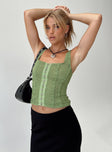 Green top Lace material Square neckline Hook and eye fastening at front Good stretch Mesh lining