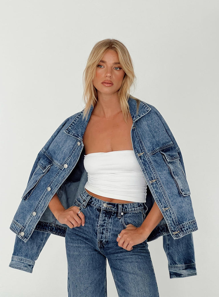 Oversized jacket Mid wash denim Classic collar Drop shoulder Button fastening at front Oversized chest pocket Single button cuff