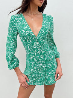 Front view of model wearing  front Princess Polly V-Neck  Kiata Long Sleeve Mini Dress Green / Floral