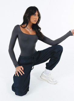 Front view of model wearing  front Princess Polly High Waisted Pants  Daughtrey Cargo Pants Navy