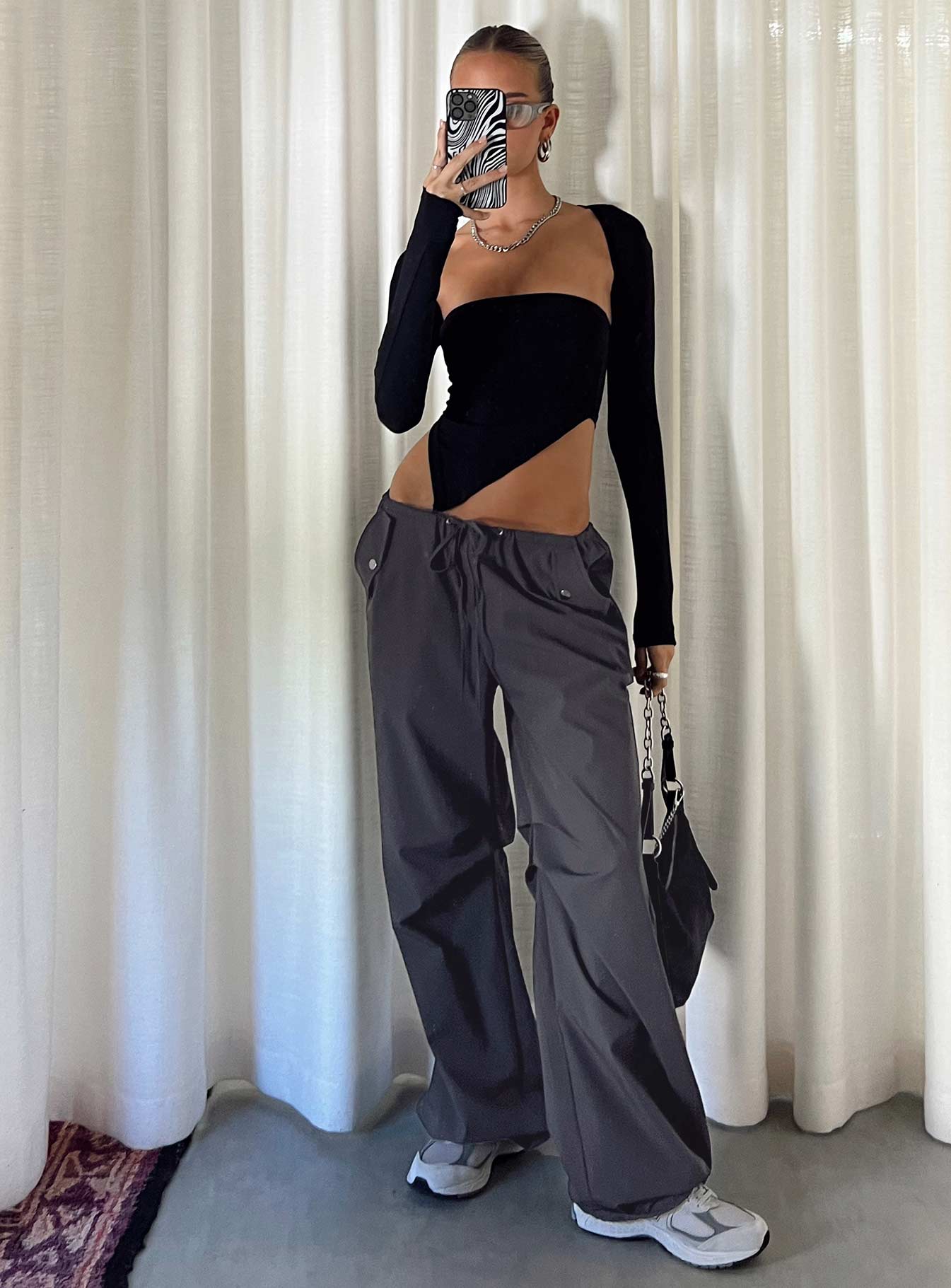 Front view of model wearing  front Princess Polly Short Sleeves High Neck  Koslo Bolero Top Black