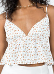 Front view of model wearing  front Princess Polly Sleeveless V-Neck  Koko Top White Floral